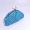 Τσάντα μικρή χειρός με vintage κούμπωμα γαλάζια