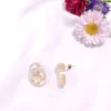 EARRING-0064 (2) Σκουλαρίκια ατσάλινα καρφάκια μικρά οβάλ με φύλλα χρυσού