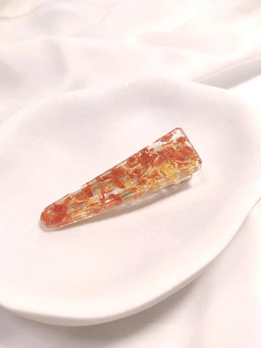 Κλιπ μαλλιών με πορτοκαλί & κίτρινα πέταλα