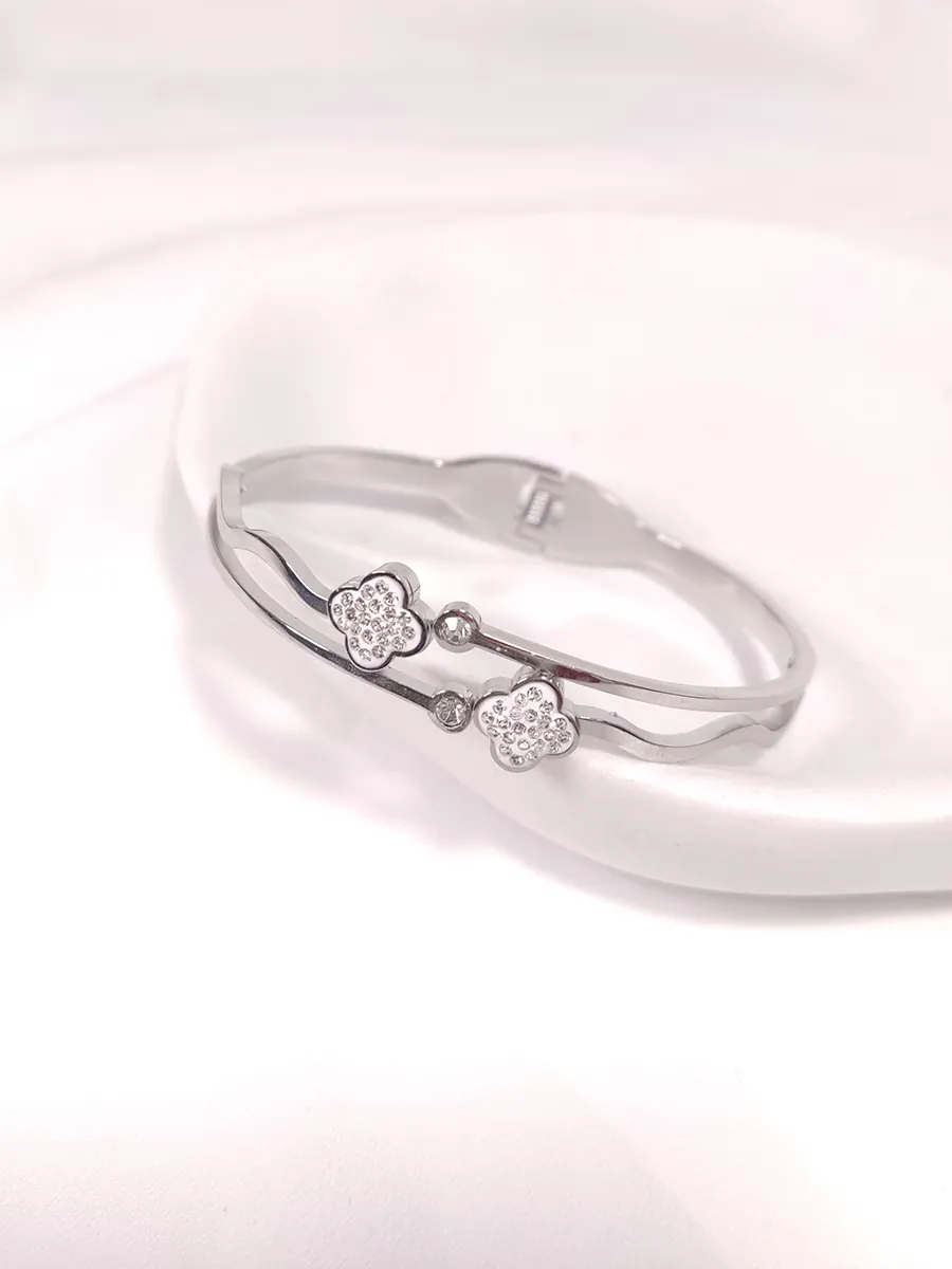 Βραχιόλι χειροπέδα ατσάλινη ασημί σταυροί με στρας