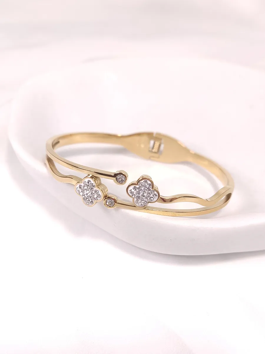 Βραχιόλι χειροπέδα ατσάλινη χρυσή - σταυροί με στρας