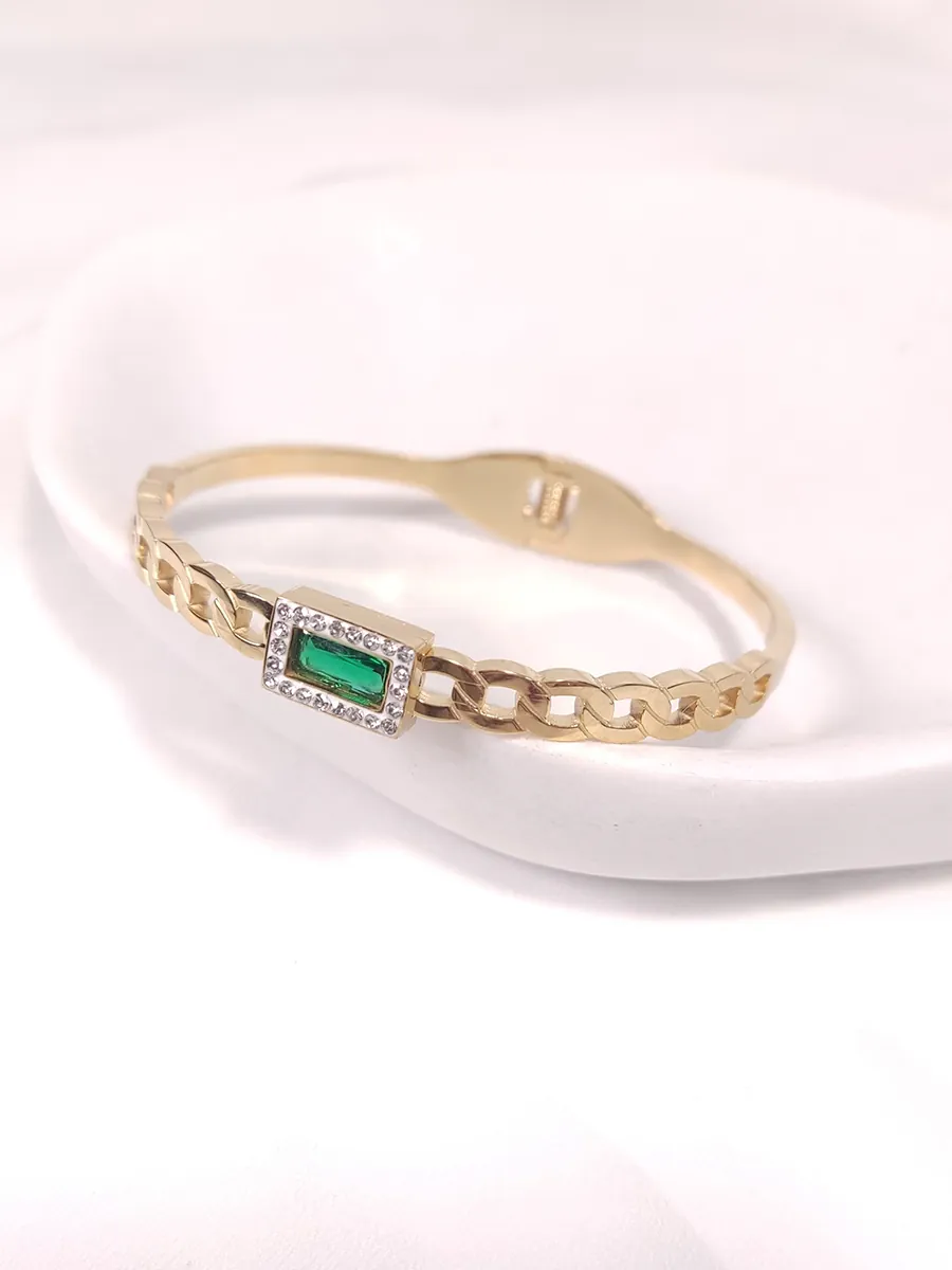 Βραχιόλι χειροπέδα ατσάλινη χρυσή με πράσινο στοιχείο