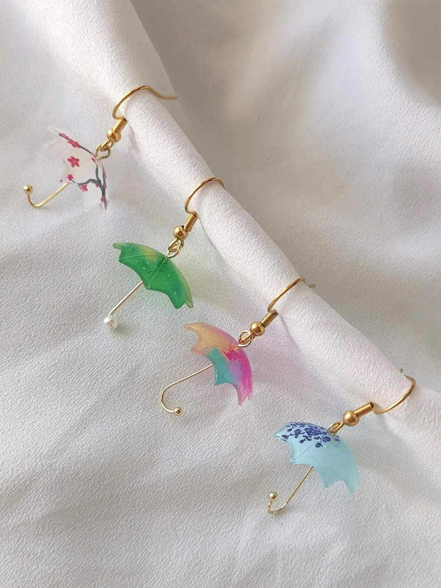 Σκουλαρίκια ατσάλινα κρεμαστά από ρητίνη ομπρέλες