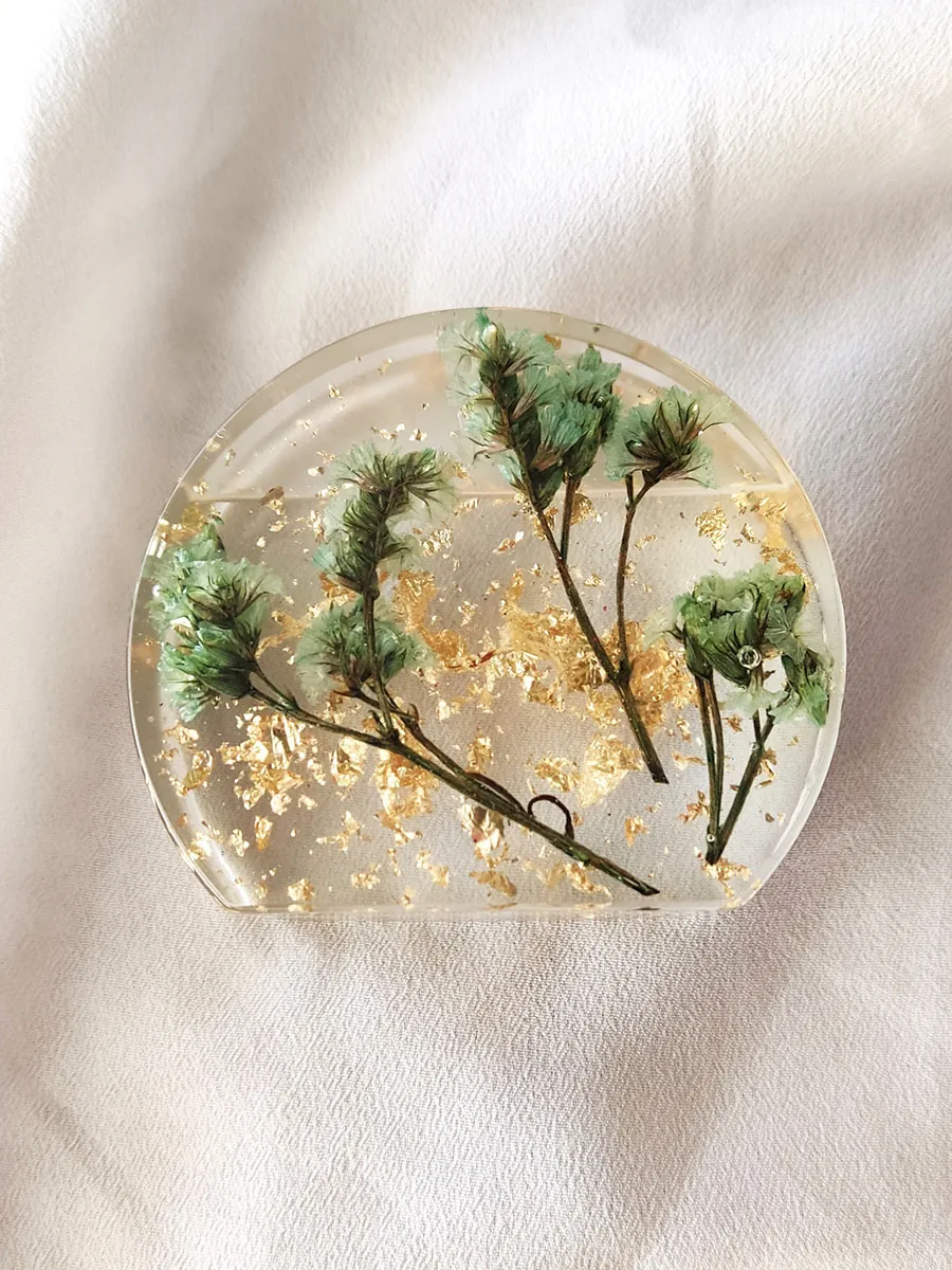 Διακοσμητική βάση για φωτογραφίες με πράσινα άνθη