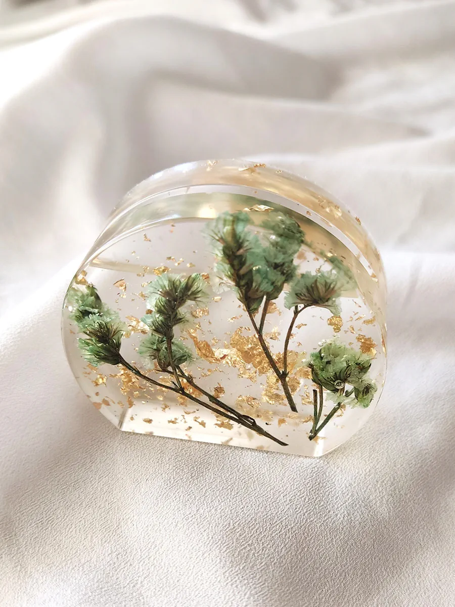 Διακοσμητική βάση για φωτογραφίες με πράσινα άνθη