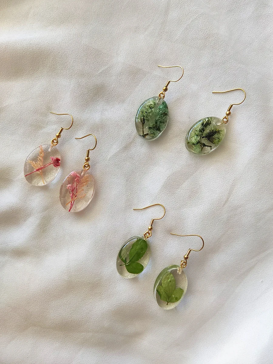 BL_EARRINGS-0008 Σκουλαρίκια ατσάλινα κρεμαστά οβάλ μικρά με αληθινά λουλούδια και φύλλα - διάφορα σχέδια | Blossom Jewelry Collection